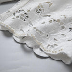 Pearl-Embellished Asymmetric Cut-Out Shorts