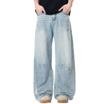 Whisker Barrel-Leg Ripped Denim Pants