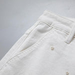 Pearl-Embellished Asymmetric Cut-Out Shorts