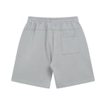 Pantalones cortos de patchwork de color liso