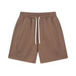 Pantalones cortos de patchwork de color liso