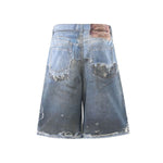 Vintage Washed Distressed Denim Bermuda Shorts with Frayed Panels