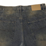 Vintage Wash Ripped Knee Loose Jeans