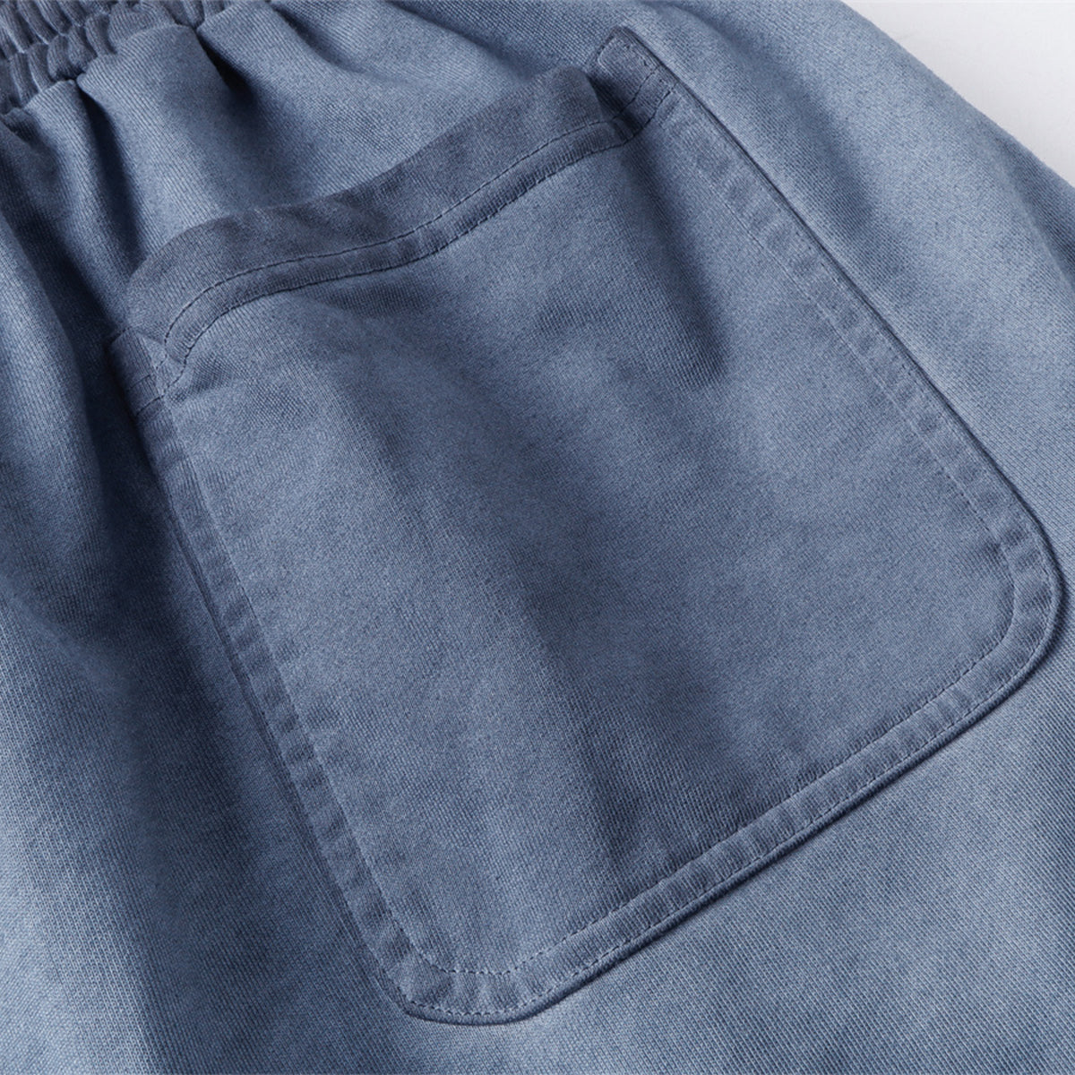 Reverse-Dyed Distressed Raw Edge Shorts