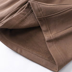 Pantalones cortos de patchwork de color liso