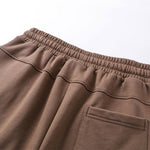 Pantalones cortos de patchwork de color liso