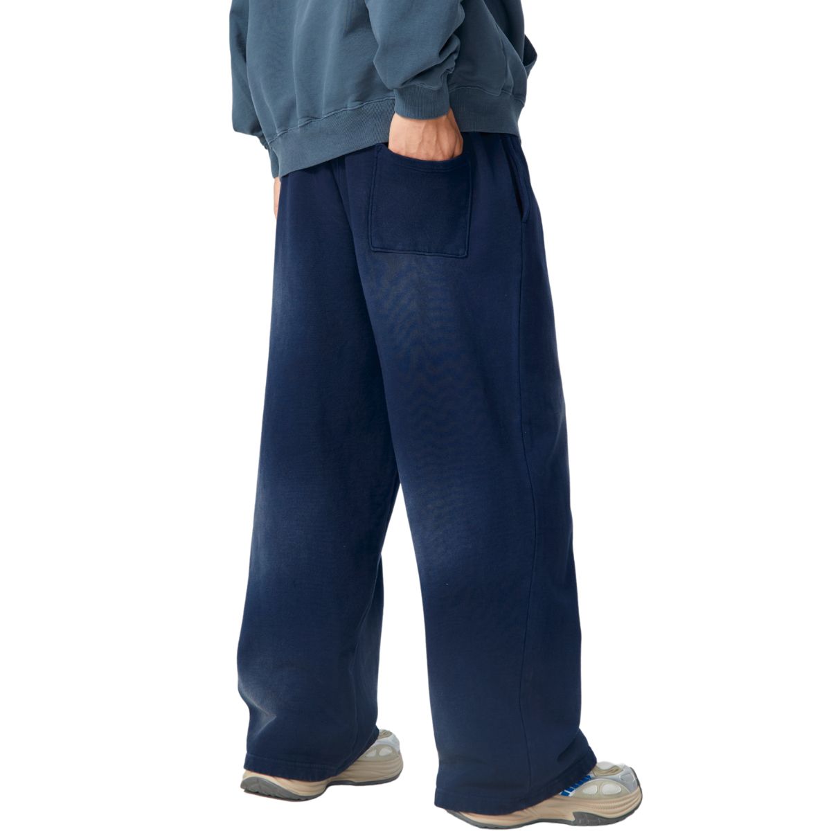 Pantalones deportivos holgados con lavado a la piedra