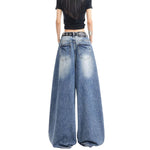 Distressed Pocket Barrel Leg Denim Jeans