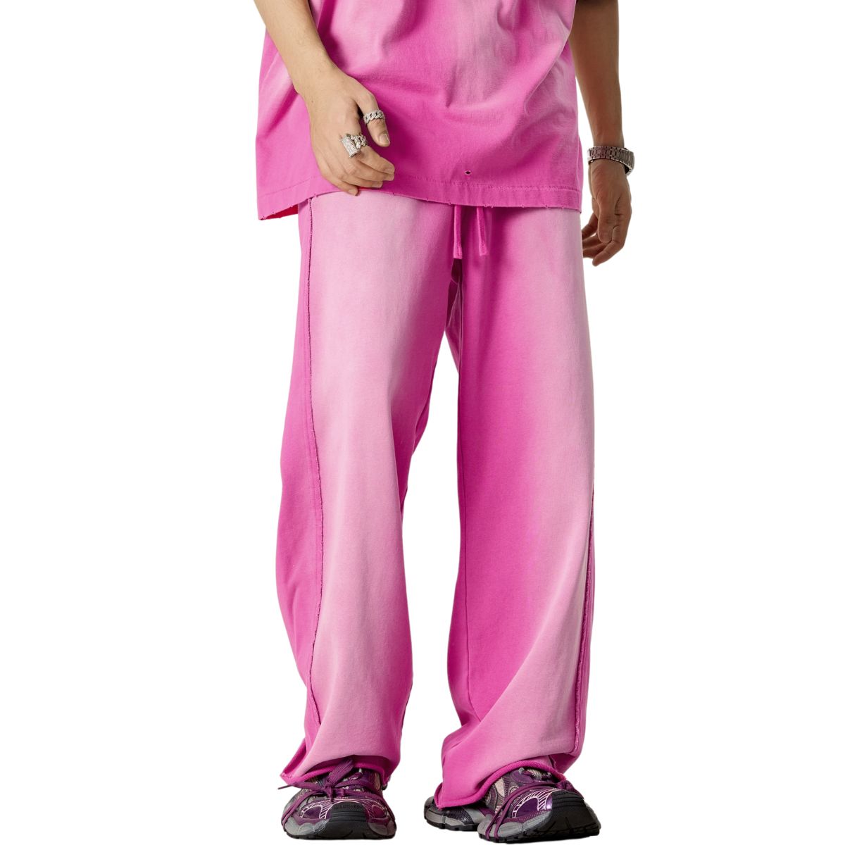 Pantalones deportivos holgados con bordes sin rematar y lavados
