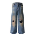 Loose Fit Embroidered Patch Distressed Jeans