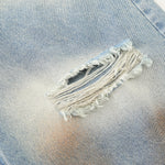 Rust-Dyed Ripped Bermuda Shorts