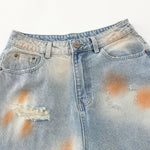Rust-Dyed Ripped Bermuda Shorts